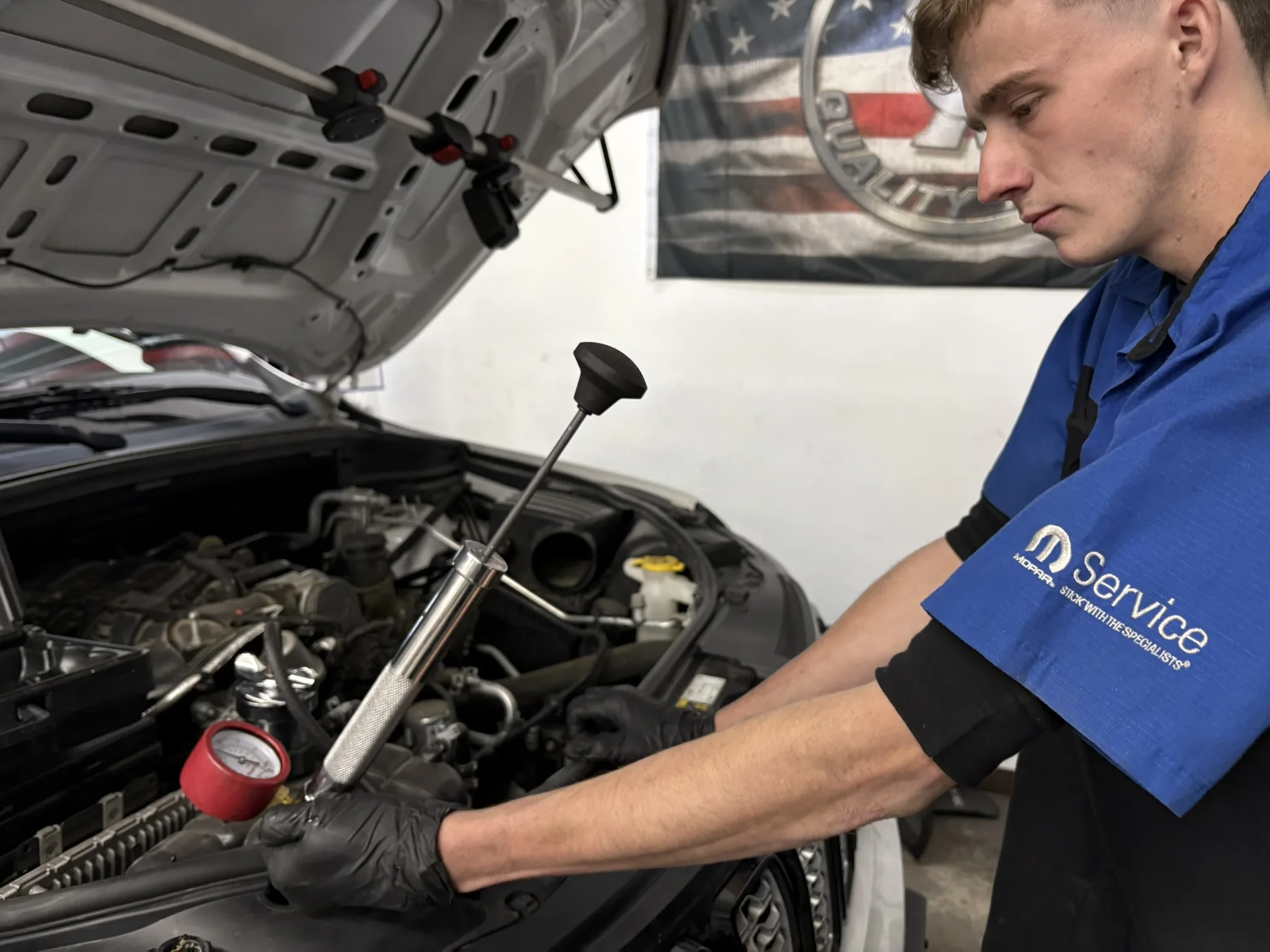 Technician reviewing live diagnostic data
